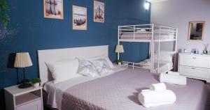Postel nebo postele na pokoji v ubytování Al Bastione B&B
