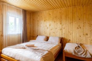 Postel nebo postele na pokoji v ubytování Dana NEW 2025