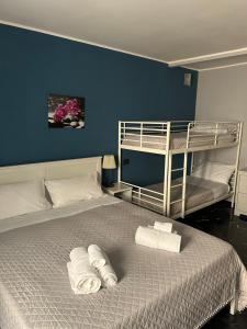 Postel nebo postele na pokoji v ubytování Al Bastione B&B