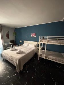 Postel nebo postele na pokoji v ubytování Al Bastione B&B