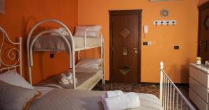 Postel nebo postele na pokoji v ubytování Al Bastione B&B