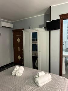 Postel nebo postele na pokoji v ubytování Al Bastione B&B