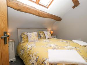 Postel nebo postele na pokoji v ubytování Yeat Stoup Cottage