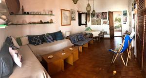 Khu vực ghế ngồi tại Dammuso Raggio di Luna