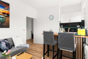 Η κουζίνα ή μικρή κουζίνα στο MOLA Apartments-Stylisches Apartment in Wetter-im Ruhrgebiet-für 3 Gäste-WLAN