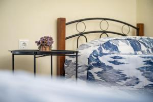 Posteľ alebo postele v izbe v ubytovaní Nostos - Psili Ammos Apartments