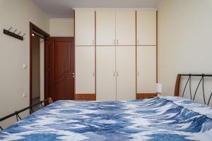 Posteľ alebo postele v izbe v ubytovaní Nostos - Psili Ammos Apartments