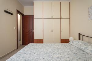 Posteľ alebo postele v izbe v ubytovaní Nostos - Psili Ammos Apartments