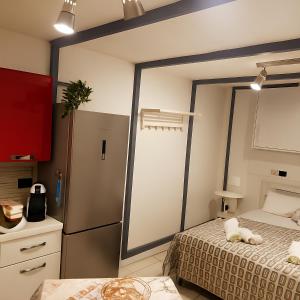 Postel nebo postele na pokoji v ubytování Al Bastione B&B