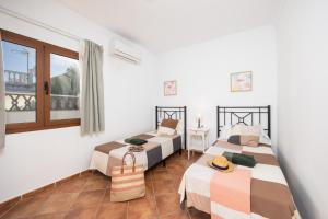 Postel nebo postele na pokoji v ubytování Villa Thomas + 37 fotografií