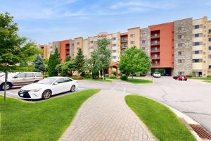 a white car parked in front of a building at Chula Vista Condo 2344 and 2346 in Wisconsin Dells