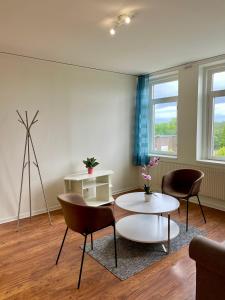 Posezení v ubytování Säffle Suites by Svaneholm Hotel