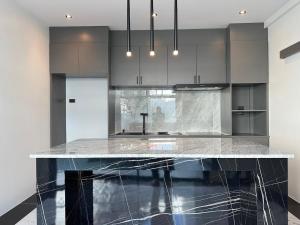 a kitchen with a marble counter top in a room at Modern ZEN Vibe 3BR Pool Villa Phuket in Ban Tha Khreng