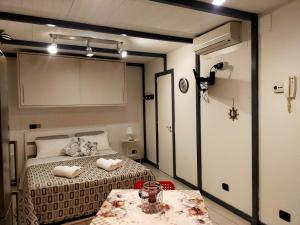 Postel nebo postele na pokoji v ubytování Al Bastione B&B