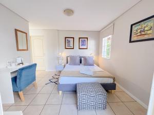 Amoris Guesthouse Randburg II - Darrenwood客房内的一张或多张床位