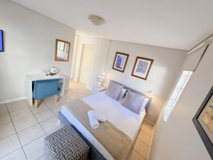 Amoris Guesthouse Randburg II - Darrenwood客房内的一张或多张床位