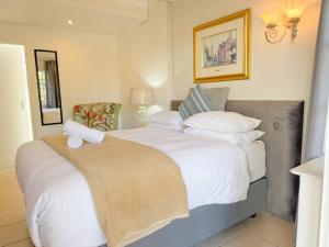 Amoris Guesthouse Randburg II - Darrenwood客房内的一张或多张床位