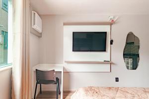TV/trung tâm giải trí tại Apartamento no centro de Nova Friburgo