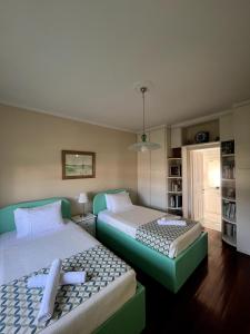 Posteľ alebo postele v izbe v ubytovaní Armonia House Potamos Village
