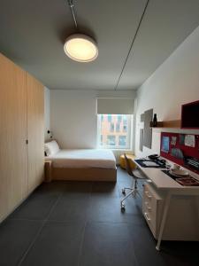 Postel nebo postele na pokoji v ubytování aparto Milan Durando