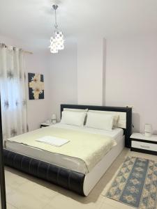 Кровать или кровати в номере Apartments Il Fiore