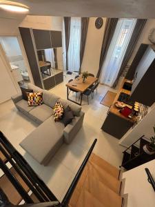 a living room with a couch and a table at Casa Angelina in Molfetta