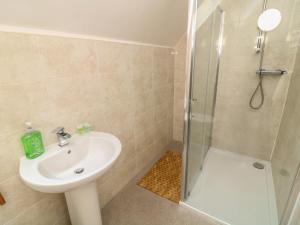 Et badeværelse på James Ville Marina Lodge 22 + 25 billeder