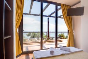 Giường trong phòng chung tại KalMa Villas +23 ảnh