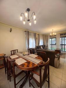Posezení v ubytování 3BedROOMED DUPLEX STAND ALONE Buziga