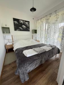 Postel nebo postele na pokoji v ubytování Baltic Cube + 13 fotografií