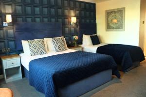 Posteľ alebo postele v izbe v ubytovaní The Newgrange Hotel