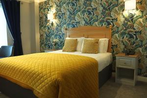 Posteľ alebo postele v izbe v ubytovaní The Newgrange Hotel