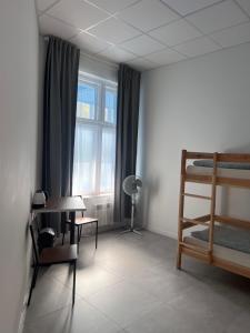 Postel nebo postele na pokoji v ubytování Golden Hostel