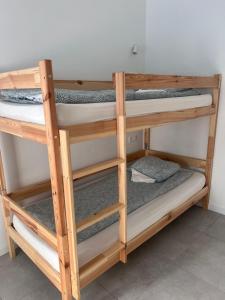 Postel nebo postele na pokoji v ubytování Golden Hostel
