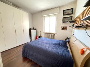 Postel nebo postele na pokoji v ubytování Bianchi BB by Affitti Brevi Rimini