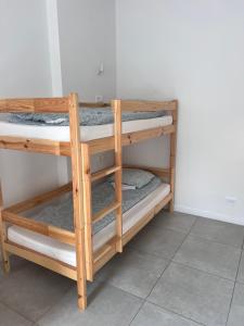 Postel nebo postele na pokoji v ubytování Golden Hostel