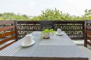 Fotografie z fotogalerie ubytování OPO Essential, Sector 21 Gurgaon v destinaci Gurgáon