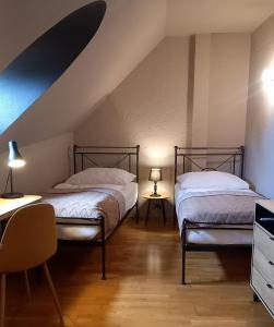 Postel nebo postele na pokoji v ubytování Boutique Hotel Templ