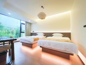 Foto dalla galleria di Tonglu Lanyu Yunting Homestay 