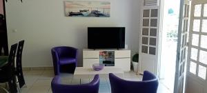 Televisyen dan/atau pusat hiburan di appartement glicéria