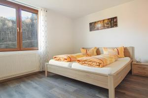 Postel nebo postele na pokoji v ubytování Hoferpeterhof
