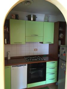 A kitchen or kitchenette at Appartamento Bosco dei Veli