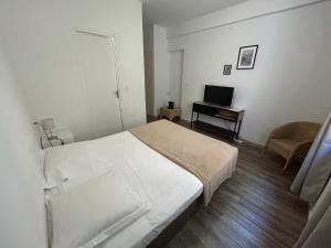Postel nebo postele na pokoji v ubytování L'Aiglon Bylitis