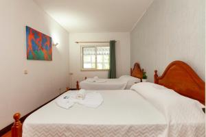 Postel nebo postele na pokoji v ubytování A72 - Praia da Luz Coast Flat