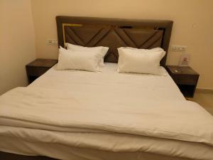Postel nebo postele na pokoji v ubytování Modest Rooms By Libra