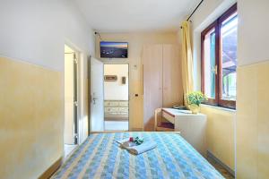 Postel nebo postele na pokoji v ubytování Hotel Edera