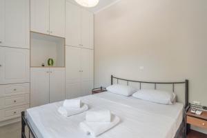Postel nebo postele na pokoji v ubytování Stathis Home