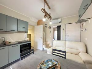 Η κουζίνα ή μικρή κουζίνα στο Stella Marina Suite Apartment