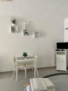 Η κουζίνα ή μικρή κουζίνα στο Milo's HOME +2 φωτογραφίες