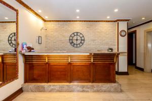 a bar with wooden cabinets and a brick wall at Nil Hotel İstanbul City Center in Istanbul +121 photos